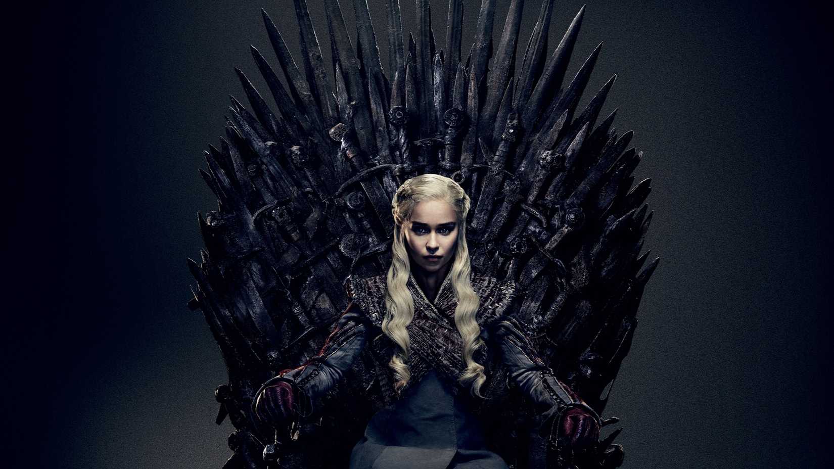Daenerys sitting on the Iron Throne in Game of Thrones promotional image. 