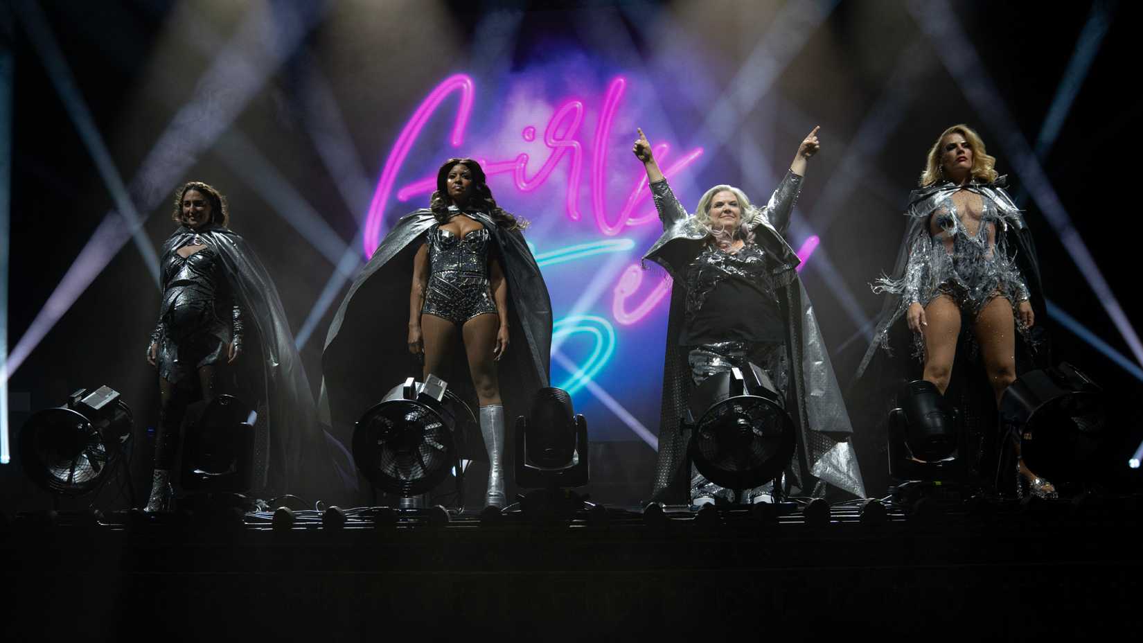 Girls5Eva performing on stage at Radio City Music Hall in season 3