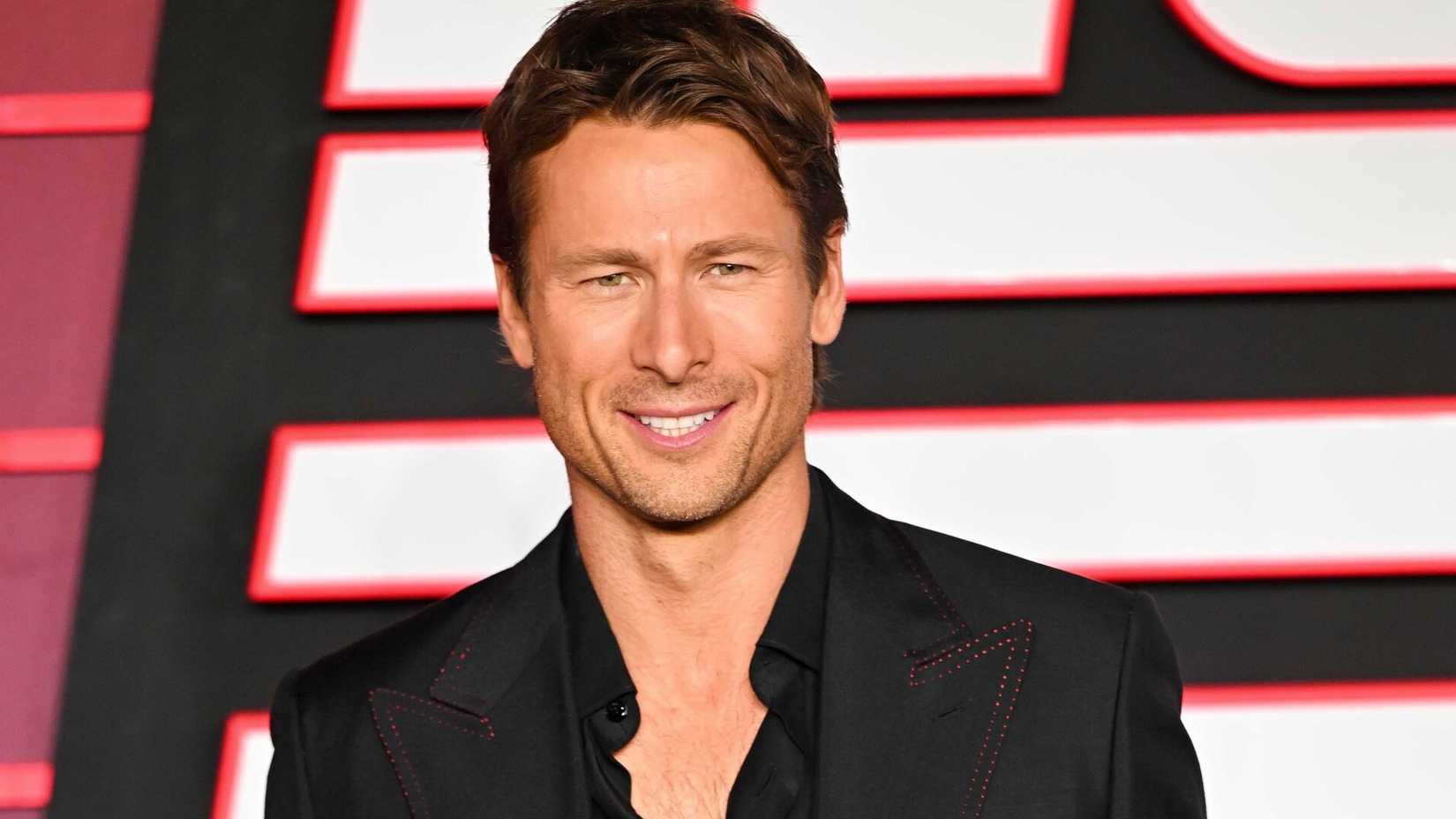 Glen Powell attending the red carpet for The Running Man