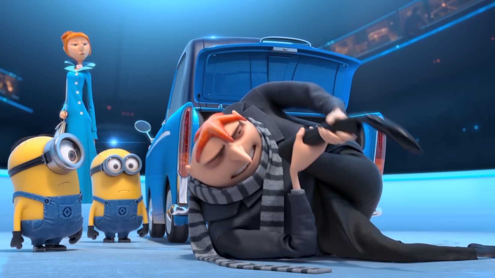 Gru with a starfish on his head in the anti villain league HQ in Despicable Me 2