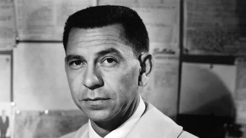 Joe Friday (Jack Webb) looking serious in Dragnet.
