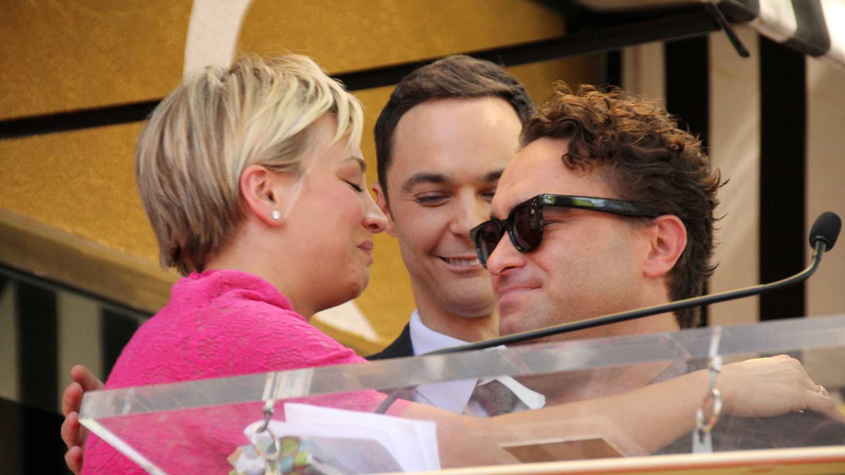 Johnny Galecki and Kaley Cuoco hugging at Kaley Cuoco Honored On The Hollywood Walk Of Fame