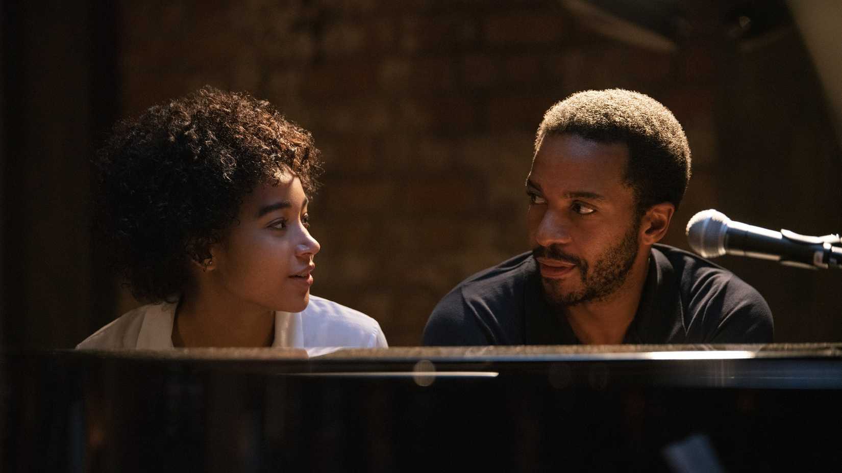 Julie and Elliot sit at a piano in Netflix's The Eddy