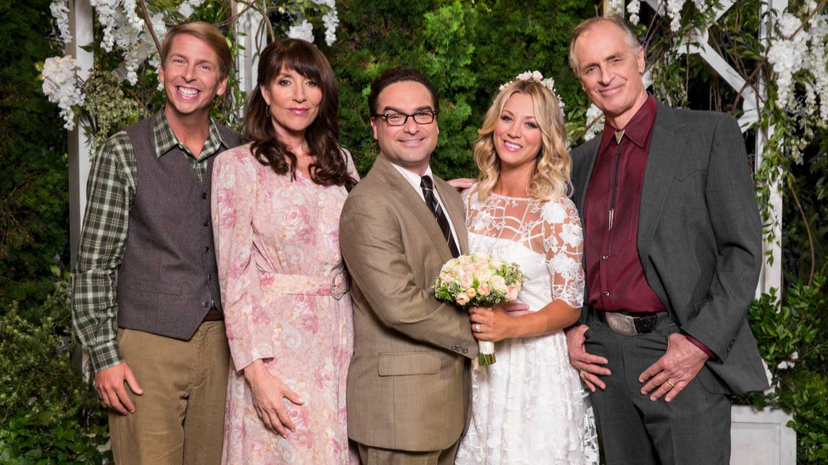 Leonard and Penny at their wedding with her family in The Big Bang Theory season 10