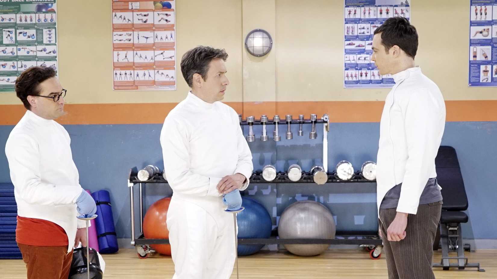 Kripke and Sheldon in fencing gear talking in The Big Bang Theory