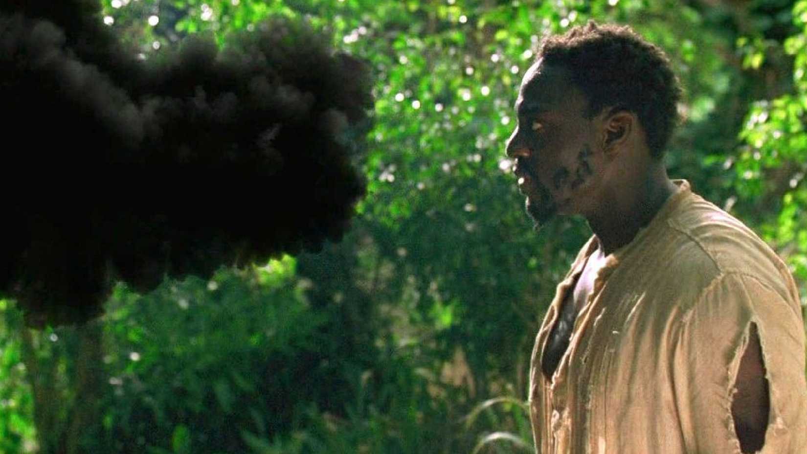 lost's smoke monster confronts mr Eko