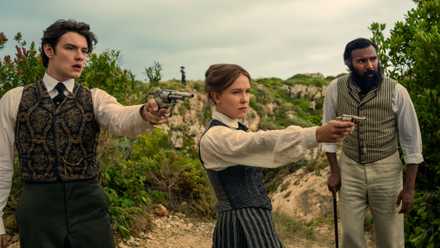 Louis Partridge as Tewkesbury, Millie Bobby Brown as Enola Holmes, Himesh Patel as Dr. Watson In Enola Holmes 3