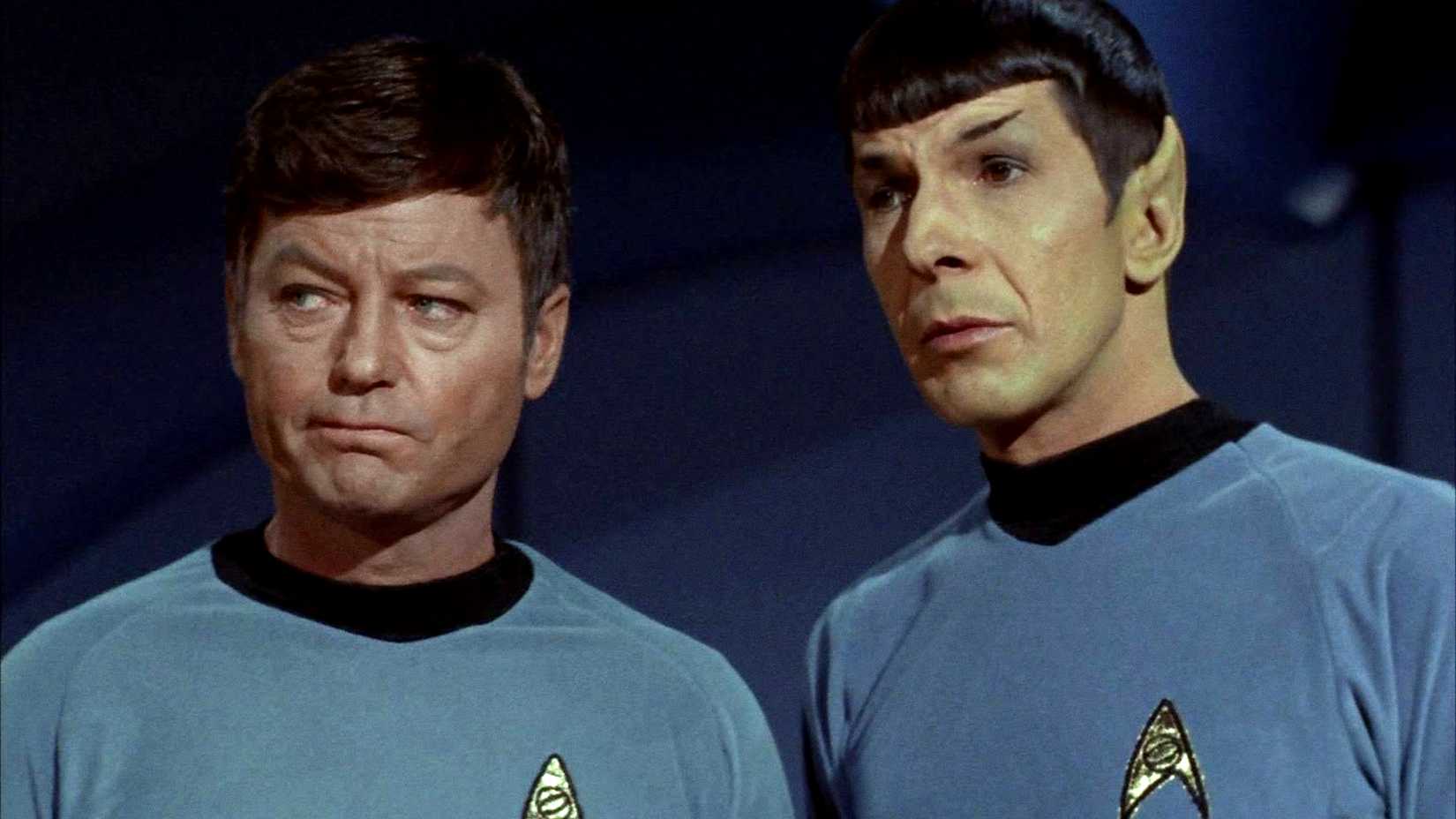 McCoy and Spock stand together in Star Trek The Original Series