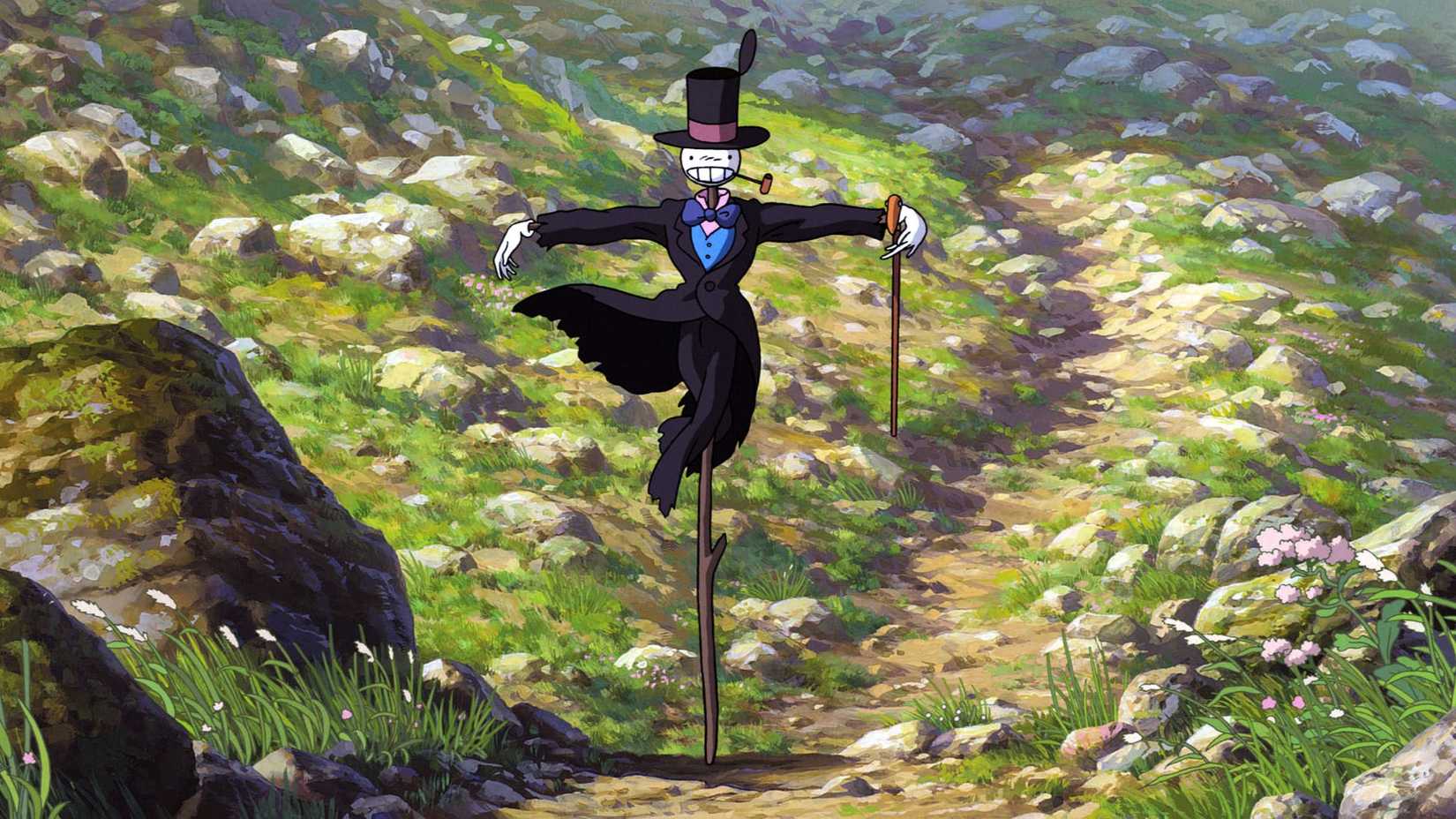 Turnip Head standing in the road with a cane in Howl's Moving Castle.