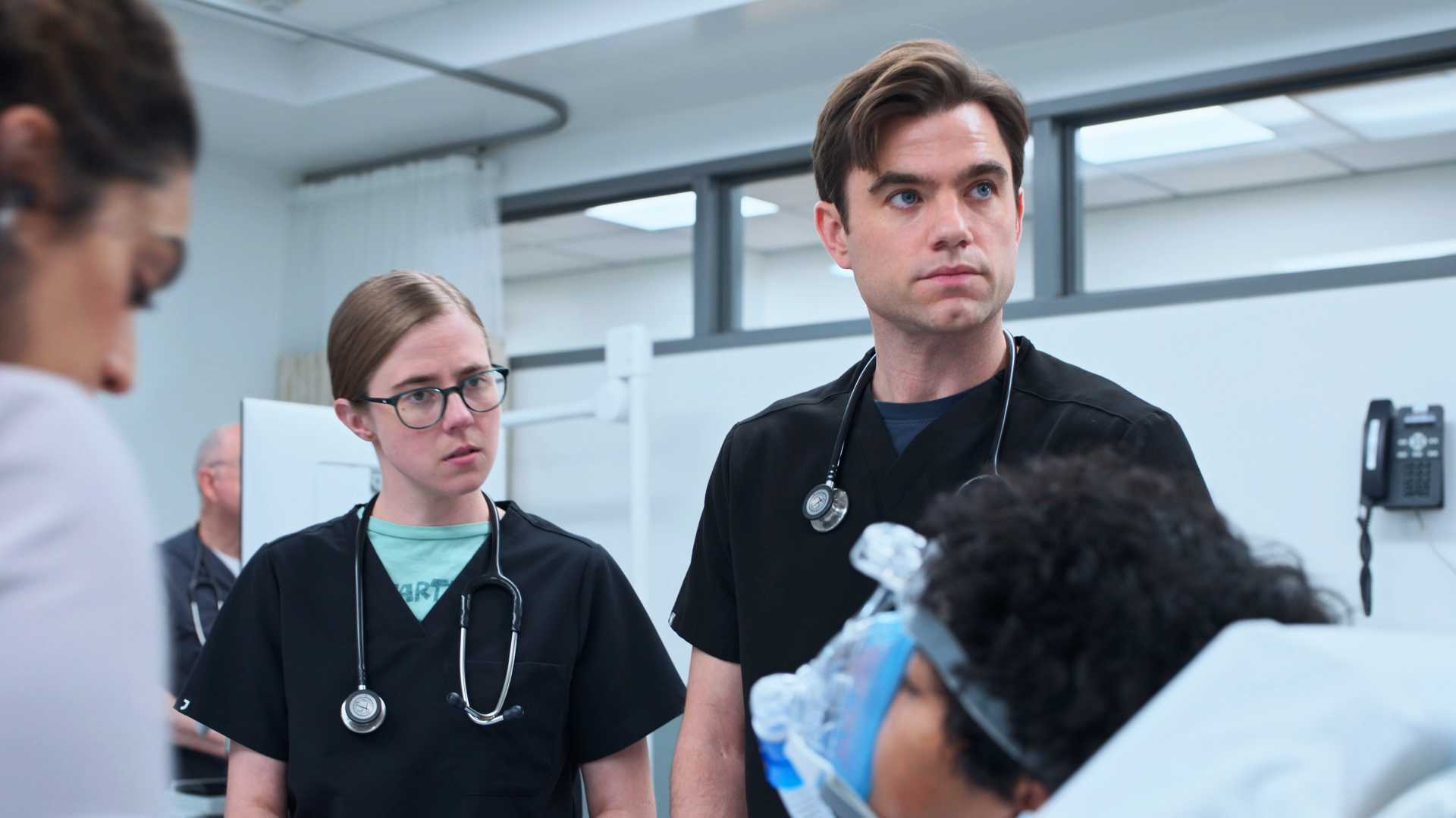 Mel and Langdon talking to a patient in The Pitt season 2, episode 13