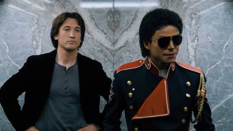 Miles Teller as John Branca and Jaafar Jackson as Michael Jackson in Michael