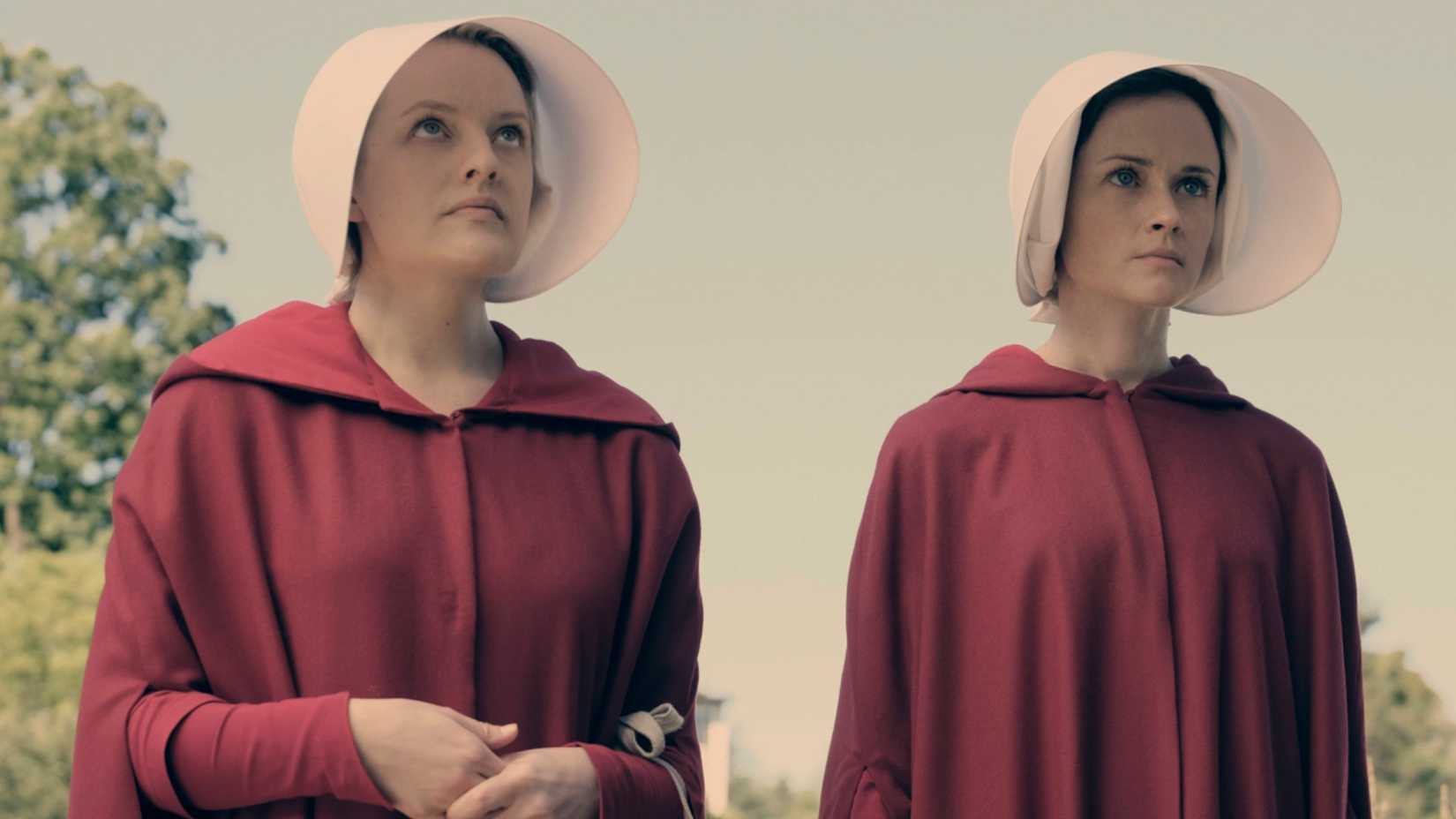 Elisabeth Moss as Offred/June and Alexis Bledel as Ofglen/Emily in The Handmaid's Tale season 1