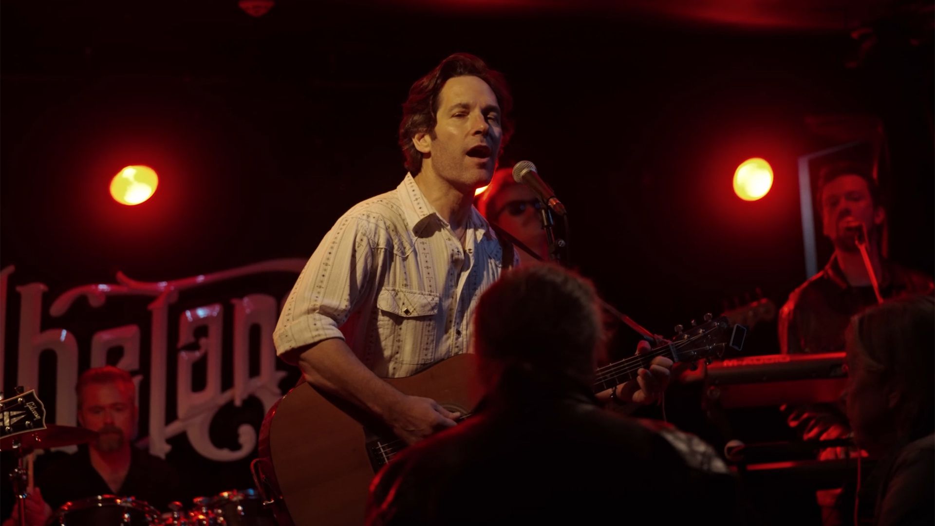 How Paul Rudd & Nick Jonas' Worlds Collide Explained By Power Ballad Crew image
