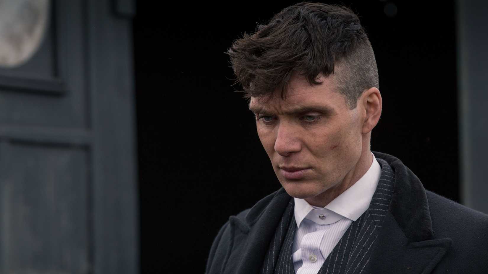 Tommy Shelby (Cillian Murphy) looking down in Peaky Blinders.
