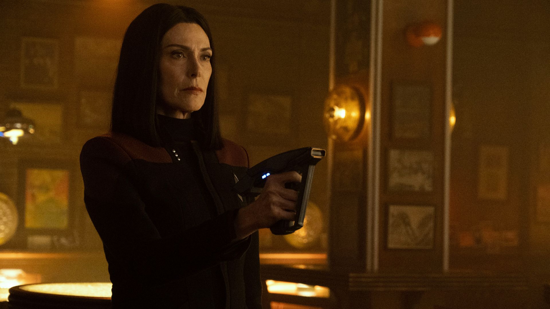 Ro Laren pointing a phaser in Star Trek Picard
