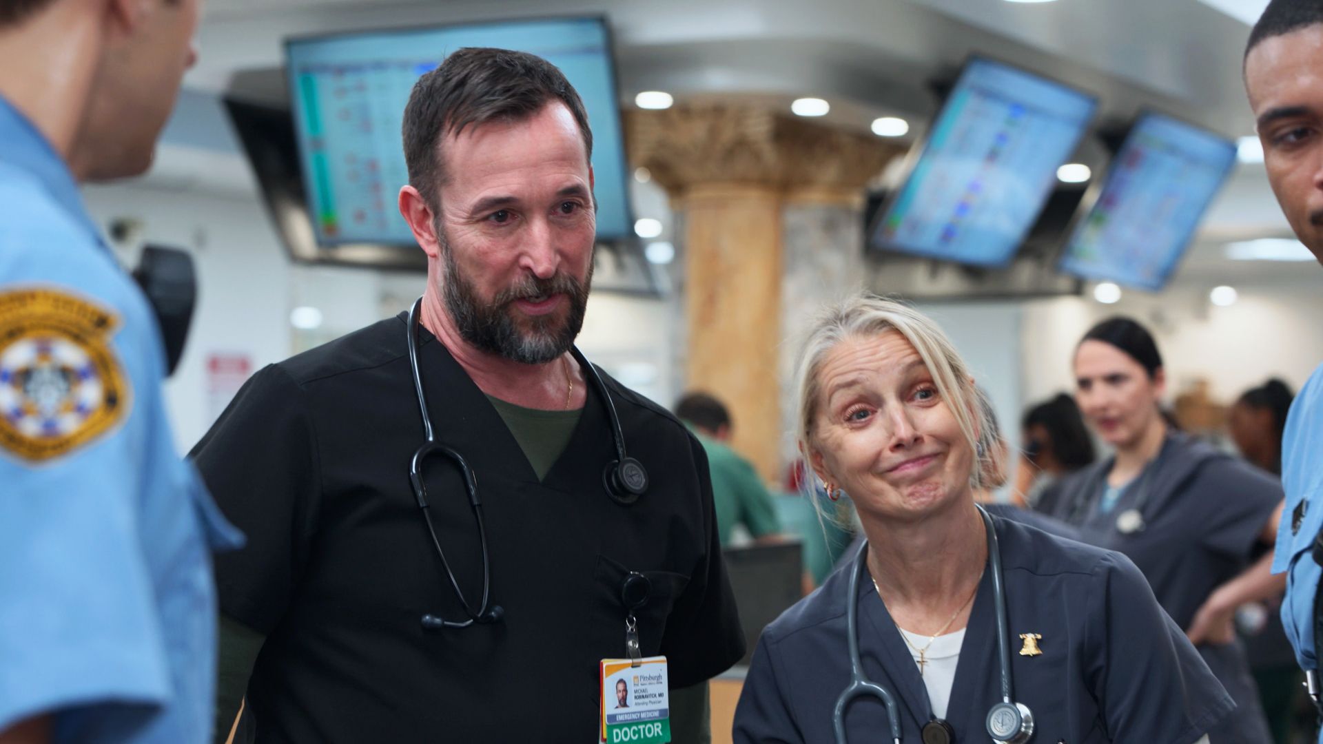Robby and Dana talking to a pair of EMTs in The Pitt season 2, episode 14