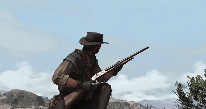 דמות Red Dead Redemption משתופפת עם רובה ציד-פעולה