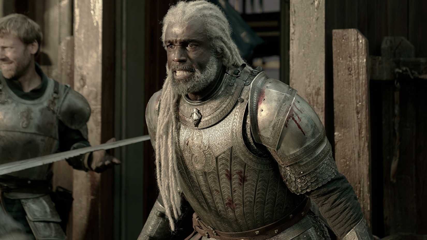 Steve Toussaint as Corlys Velaryon wearing bloodied armor in House of the Dragon season 3