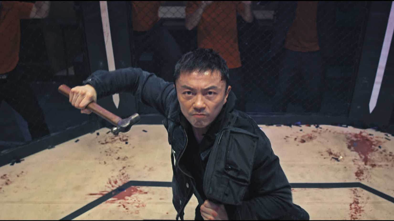 Wang Wei, Played By Xie Miao, holding a hammer in The Furious