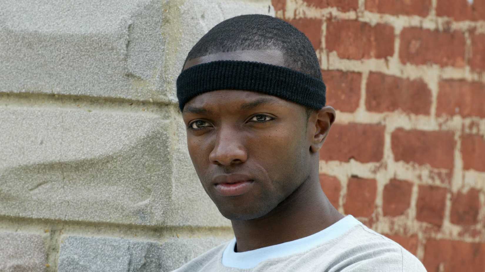 Marlo (Jamie Hector) staring at someone in The Wire season 3.