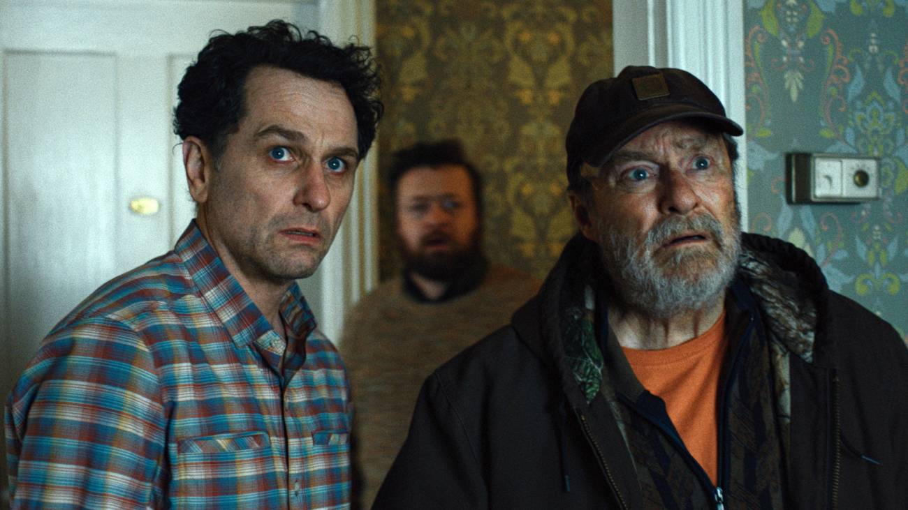 Tom and Wyck looking shocked at the inn in Widow's Bay