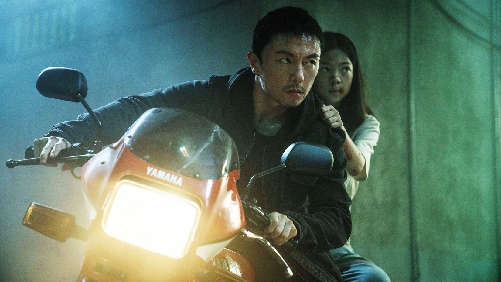 Wang Wei and Rainy on a motorcycle in The Furious