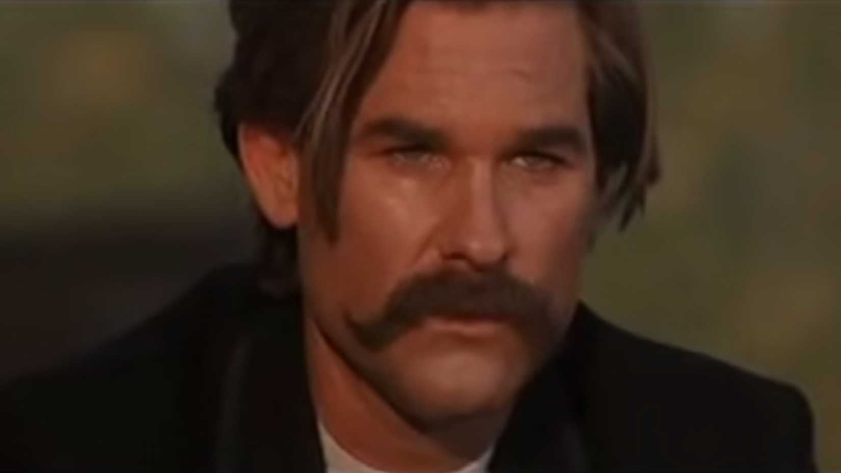 Wyatt Earp (Kurt Russell) looking sad during the Well, bye scene in Tombstone