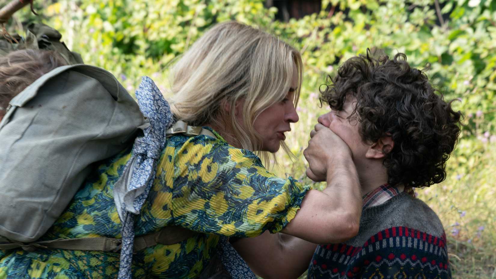 Emily Blunt’s Evelyn making Noah Jupe’s Marcus stay quiet in A Quiet Place: Part II