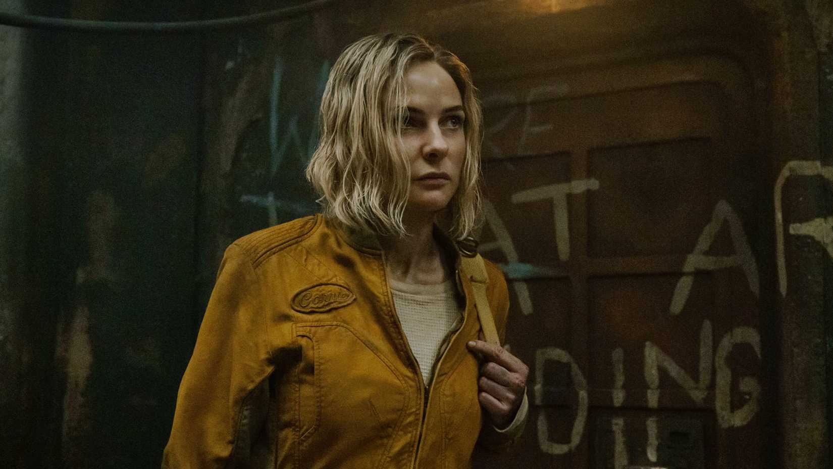 Rebecca Ferguson’s Juliette walking in Silo 17 in Silo season 2