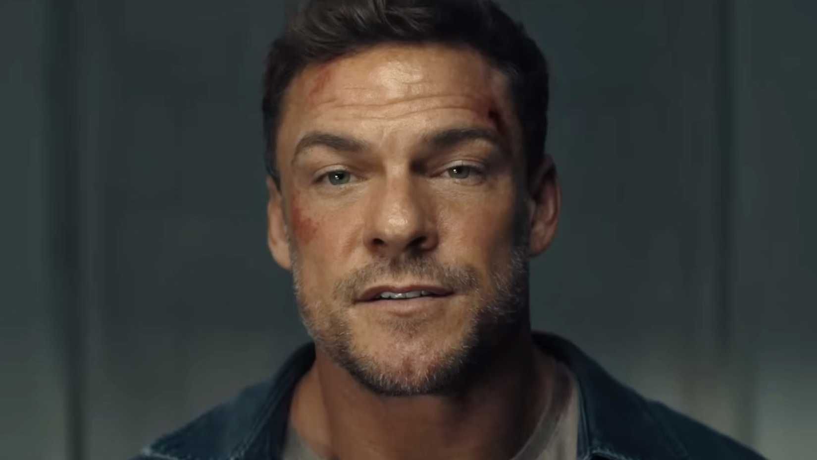 Alan Ritchson’s Jack Reacher looking stoic in a scene from Reacher season 4’s trailer