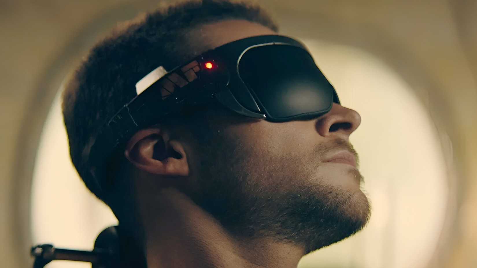 Jack Reynor’s Burton wearing a VR set in Prime Video’s The Peripheral