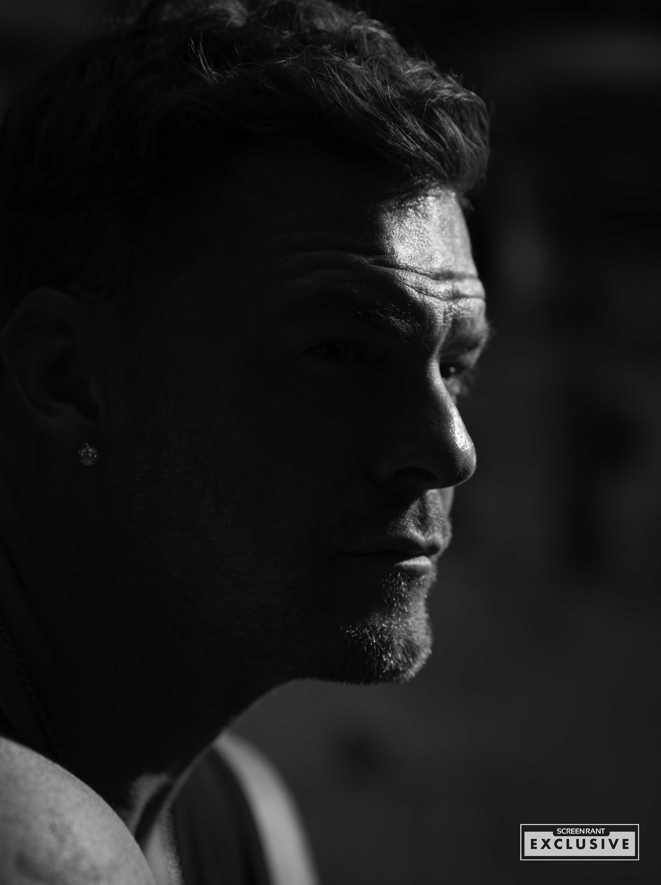 Alan Ritchson Profile Photo 2026 ScreenRant Motor City 5 Black White