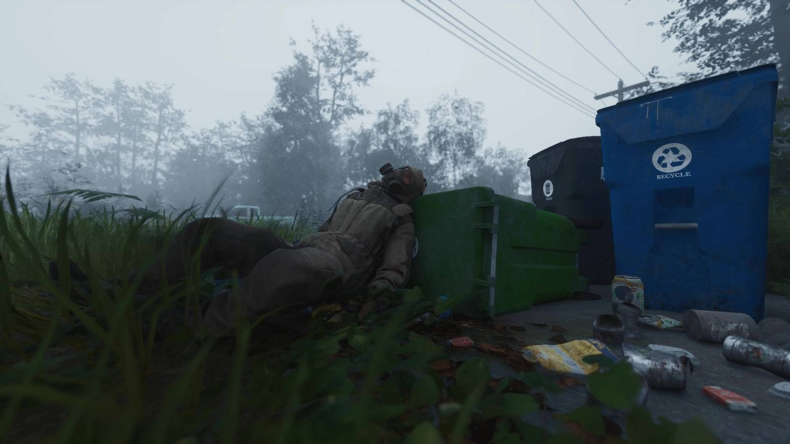 A character wearing a hazmat suit is lying down with their head against a garbage bin in Ardem.