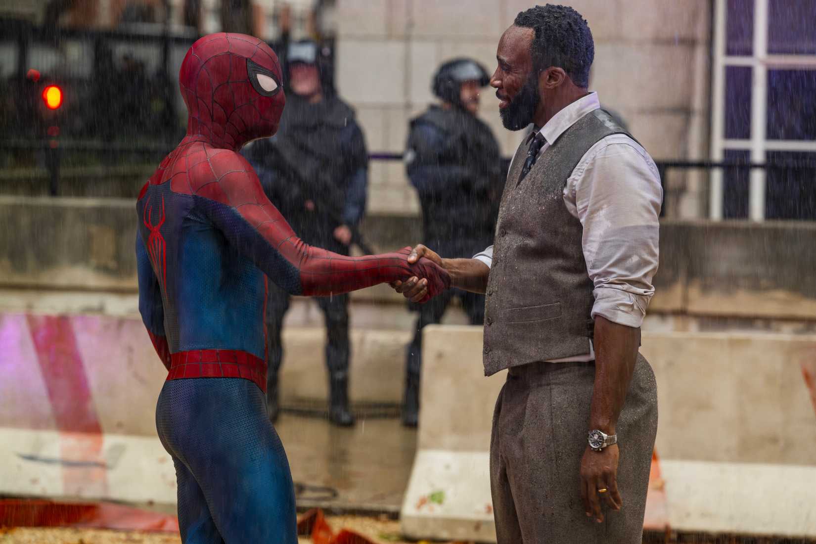 Bill (Tramell Tillman, right) thanks Spider-Man in SPIDER-MAN BRAND NEW DAY