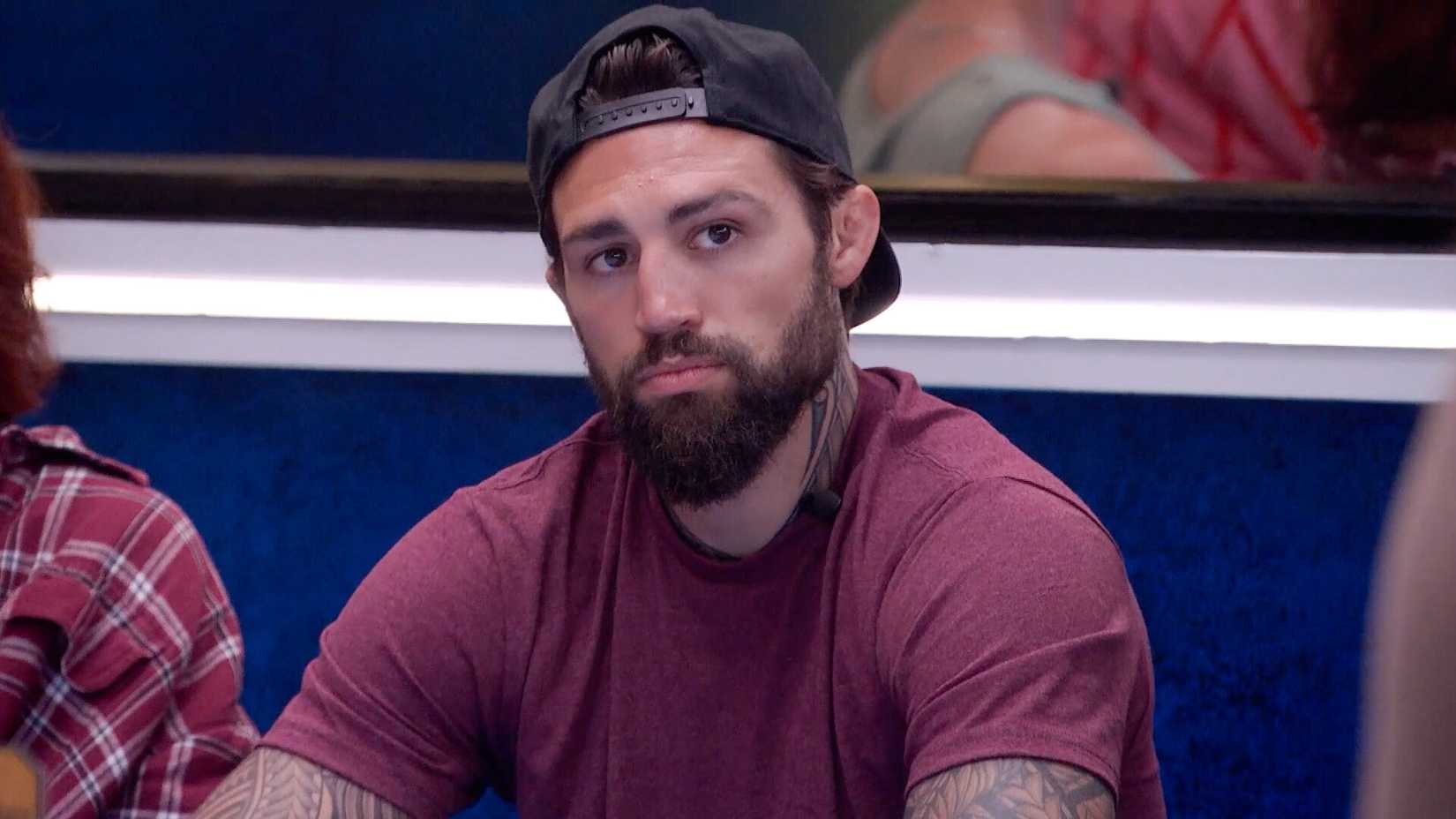 Kamu sitting at the kitchen table on Big Brother 28, episode 3.