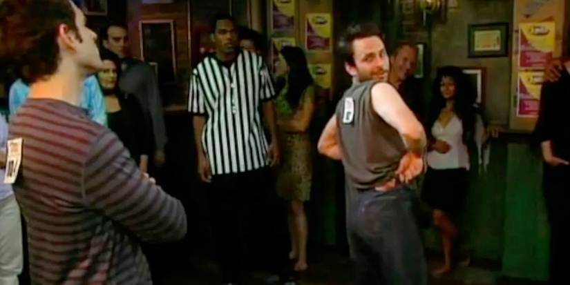Charlie dancing in front of Dennis in It's Always Sunny in Philadelphia The Gang Dances Their Asses Off