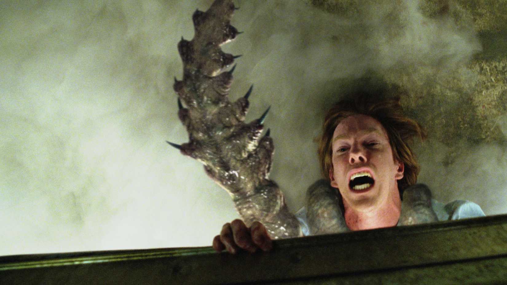 Chris Owen attacked by a large tentacle in The Mist 2007