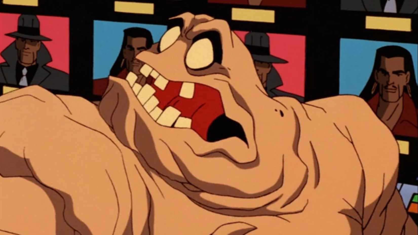 Clayface reacting in shock to the TV screens depicting his past movie roles