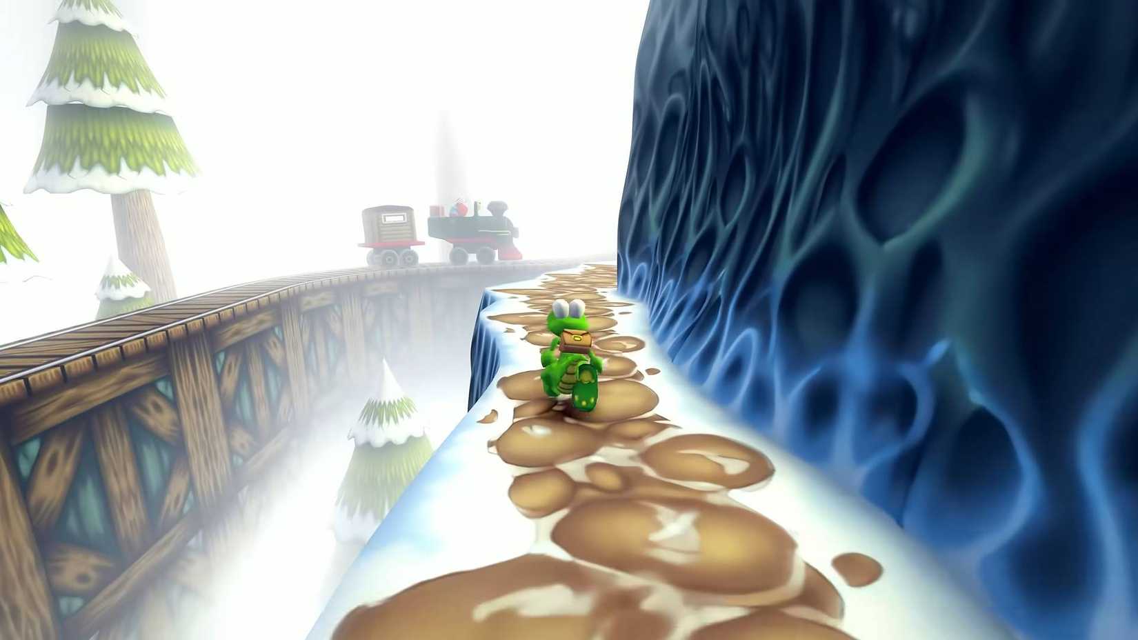 Croc running across a snowy mountain with a train in the background in Croc 2: Kingdom of the Gobbos.