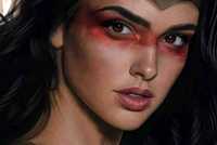 DC's Absolute Wonder Woman looks at the camera wearing red make-up around her eyes