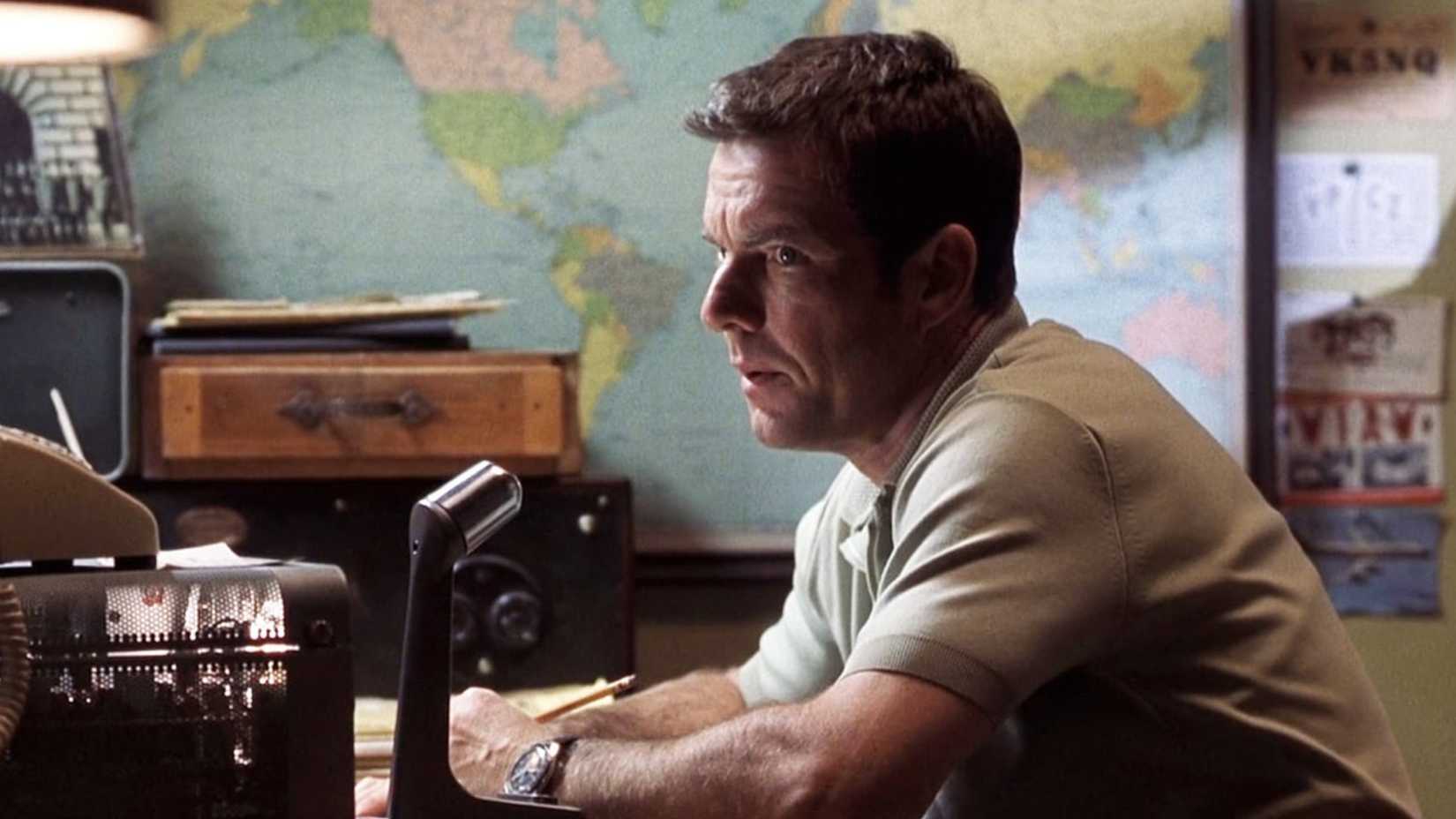 Dennis Quaid is looking to the side in Frequency