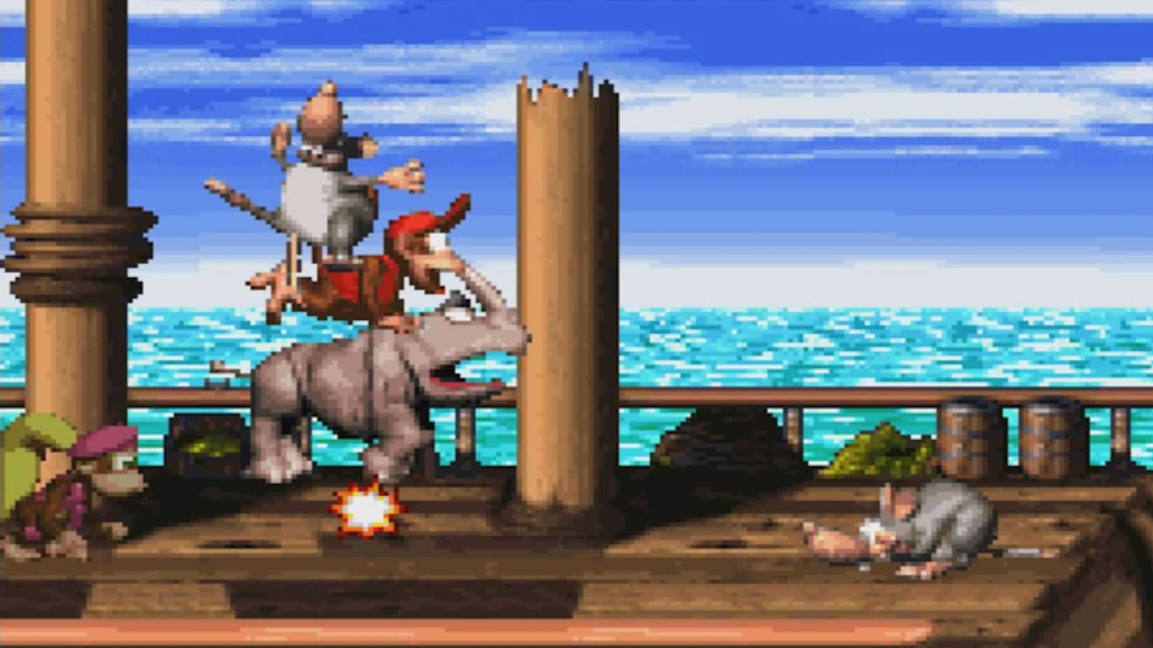 Diddy Kong riding Ramby across a ship deck with large rats. Dixie stands on the edge of the frame.