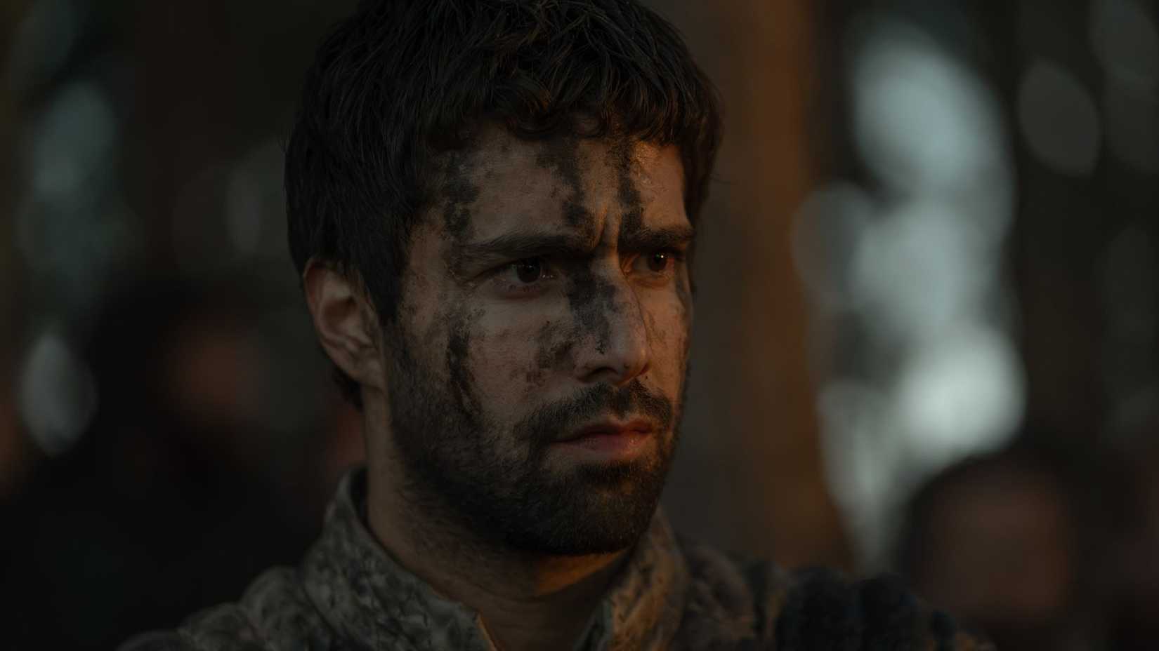 Criston Cole with blood on his face in House of the Dragon