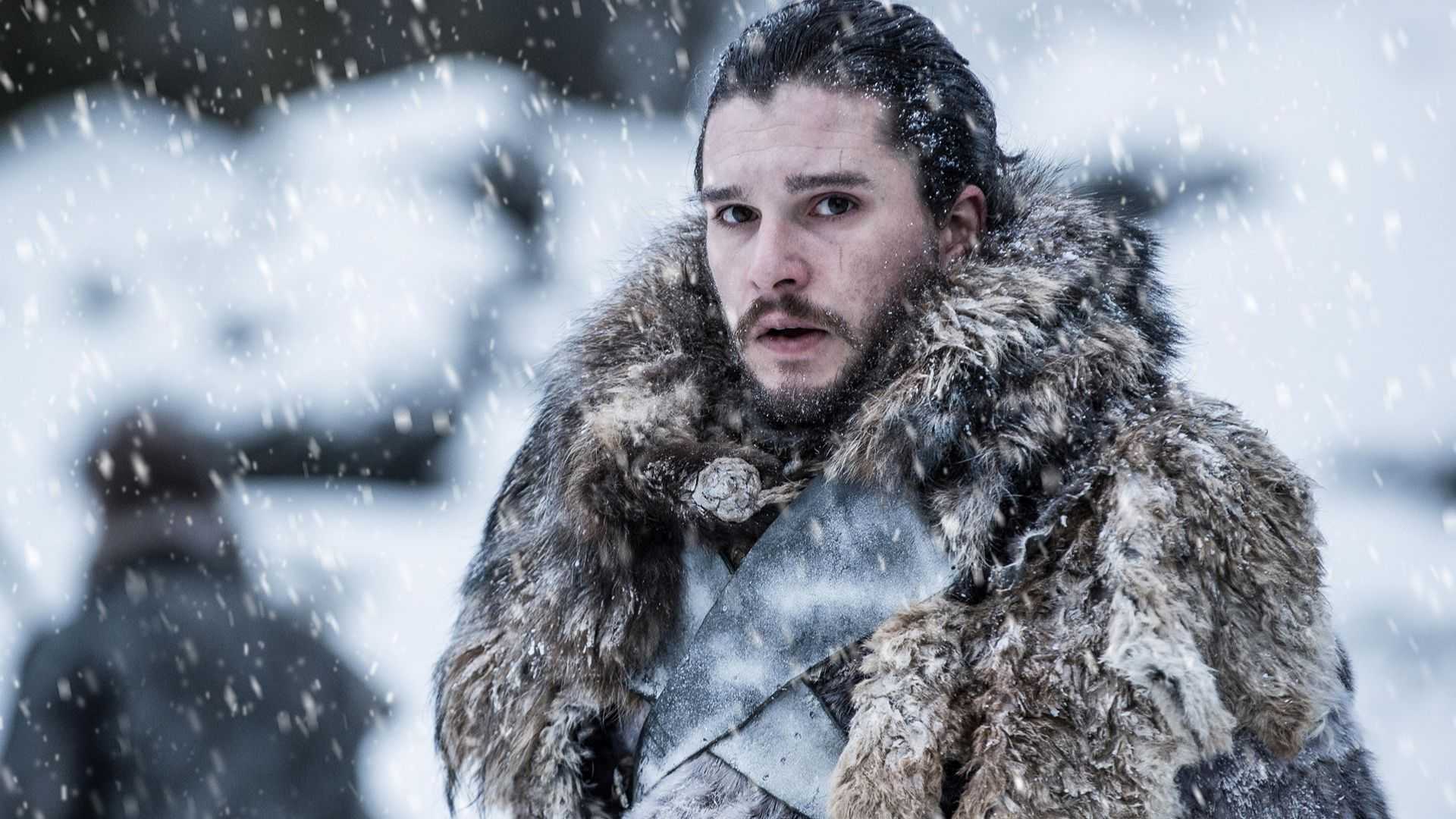 Jon Snow covered in snow and furs in Game of Thrones