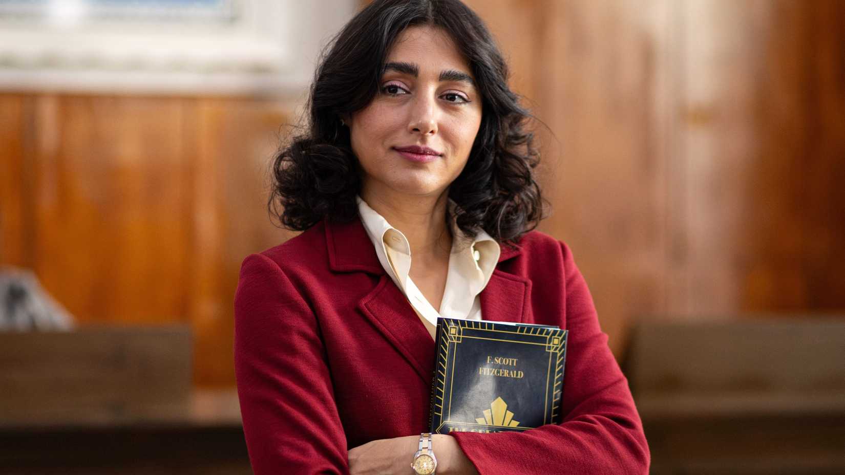 Golshifteh Farahadi holding a copy of The Great Gatsby in Reading Lolita in Tehran
