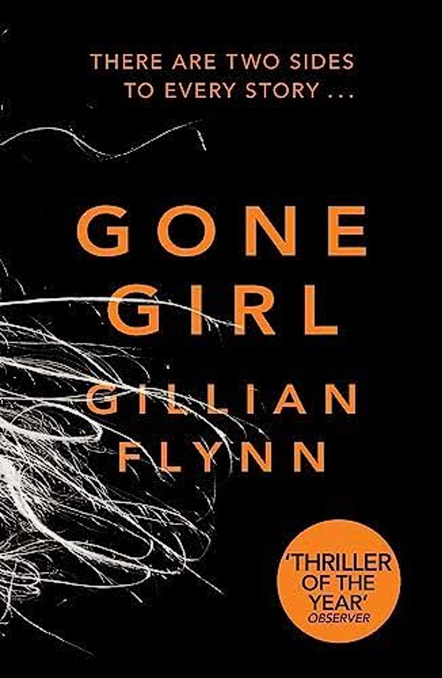 Gone Girl book cover, with sticker proclaiming it thriller of the year
