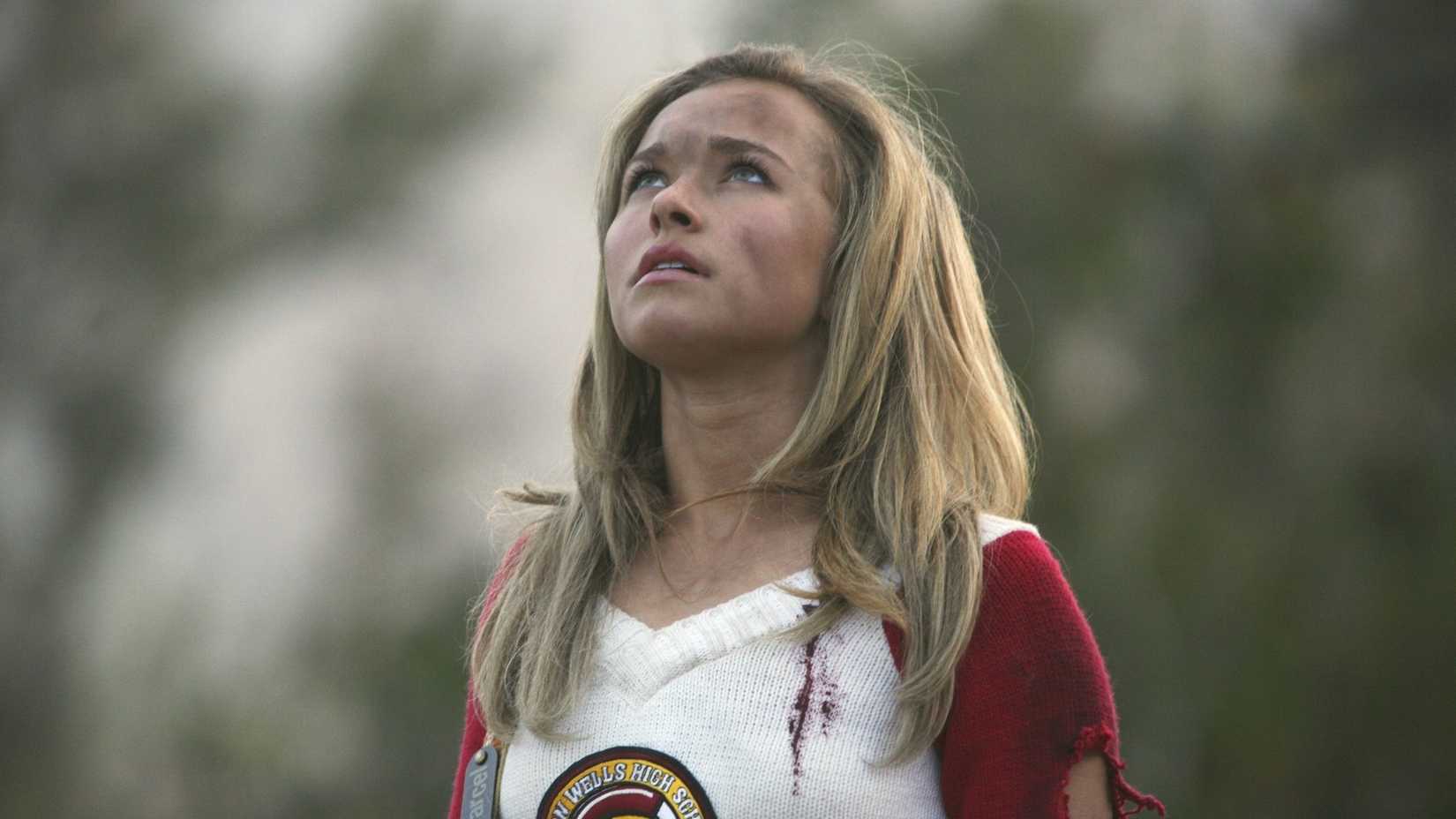 Claire Bennet covered in dirt and soot while in her cheerleader uniform