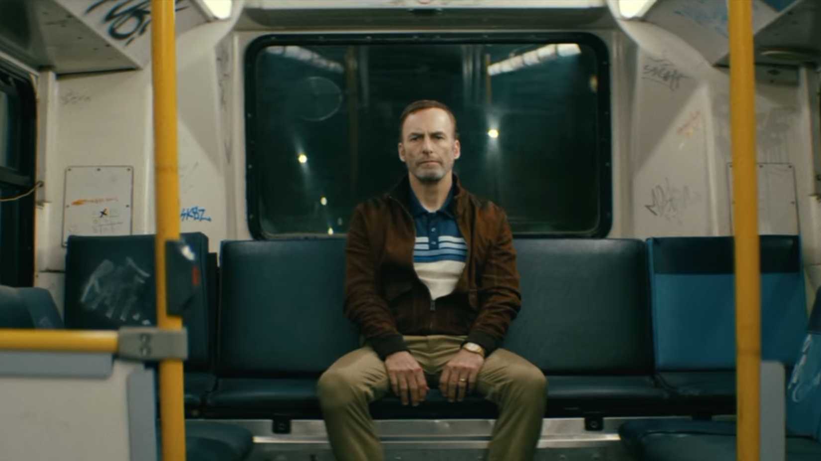 Hutch (Bob Odenkirk) watching thugs board the bus in Nobody