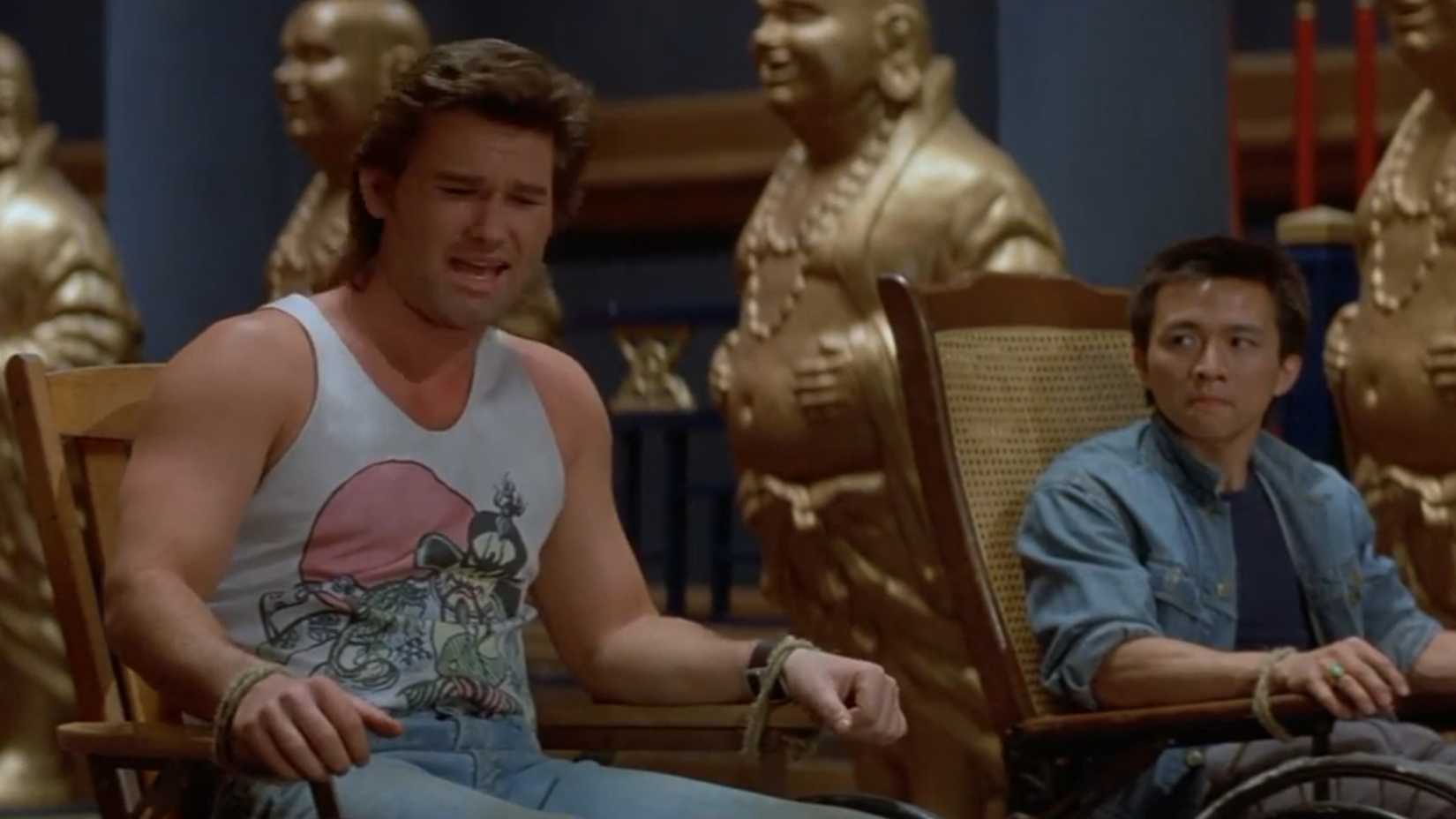 Jack Burton lecturing Lo Pan as Wang looks on in Big Trouble in Little China