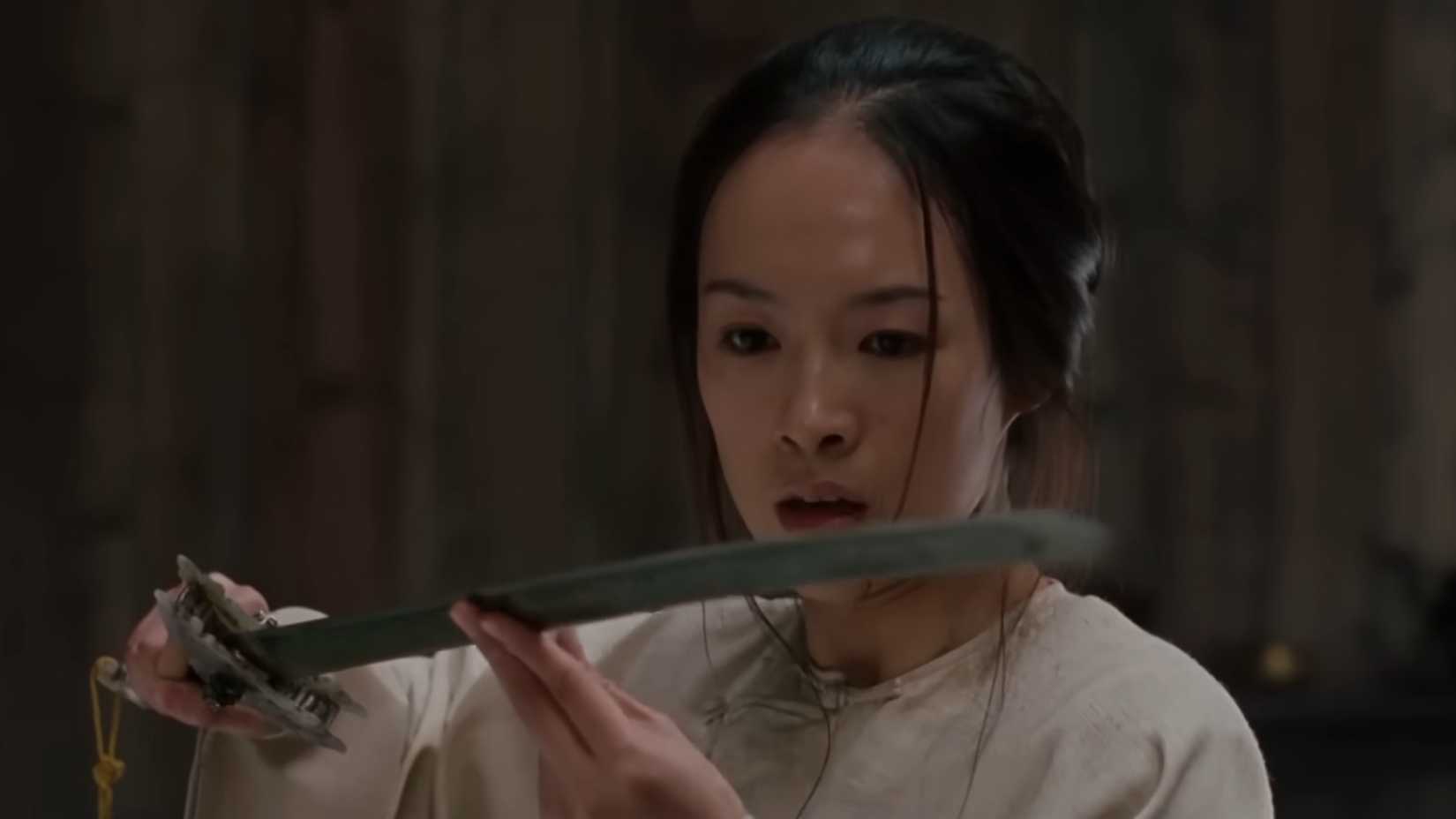 Jen inspecting the blade of the Green Destiny in Crouching Tiger Hidden Dragon